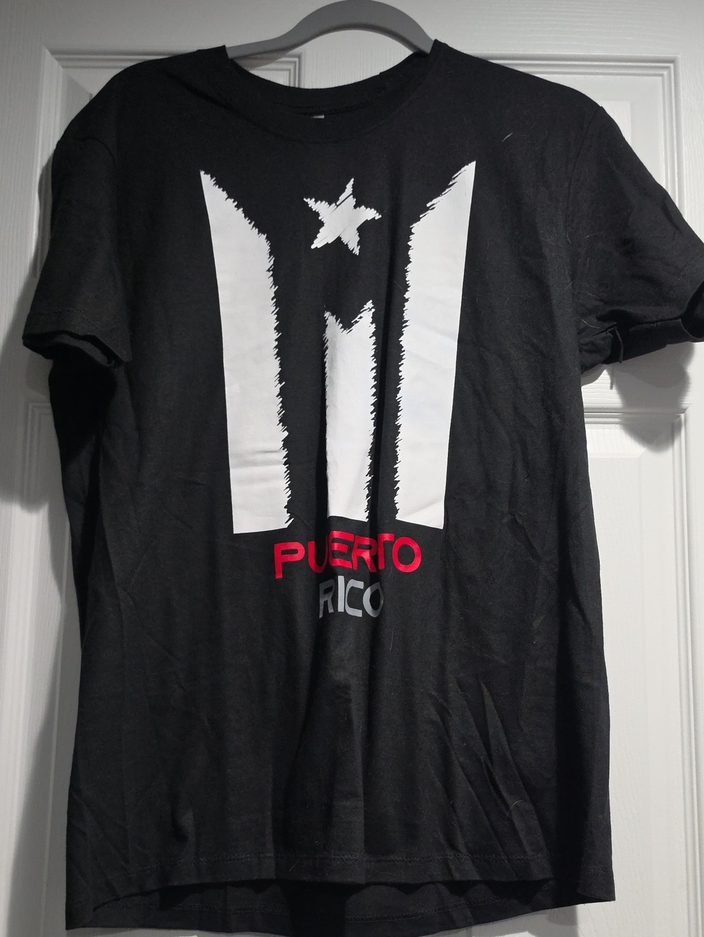 Caribbean Black Short-Sleeve Tee with White Graphic and Red Text